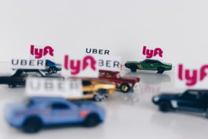 Uber and Lyft toy cars.