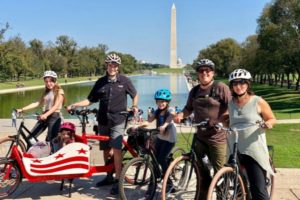 A family riding bikes together.