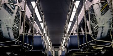 Seats in an empty rail car on DC Metro.