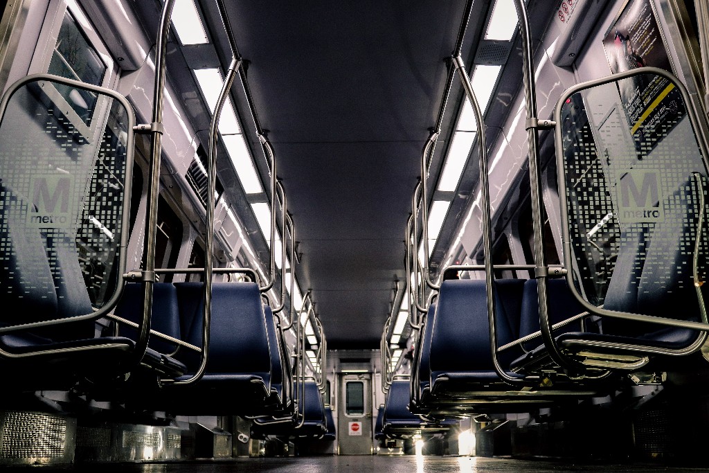 Seats in an empty rail car on DC Metro.