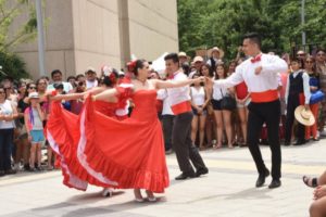 Men and women dancing.