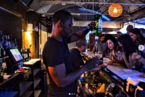 Happy hour at a rooftop bar