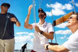 Three men on a boat