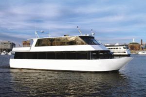 A yacht with an open-air roof deck