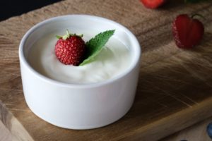 Yogurt with a strawberry