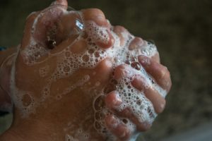 Hands washed with soap and water.