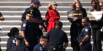 Jane Fonda being arrested.