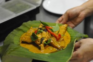 A dish on a green leaf.