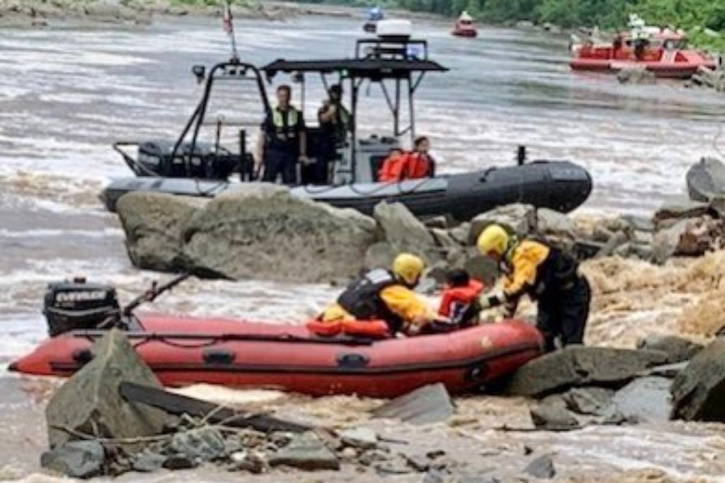 A total of 12 people were rescued from the rising waters on the Potomac River on Saturday.