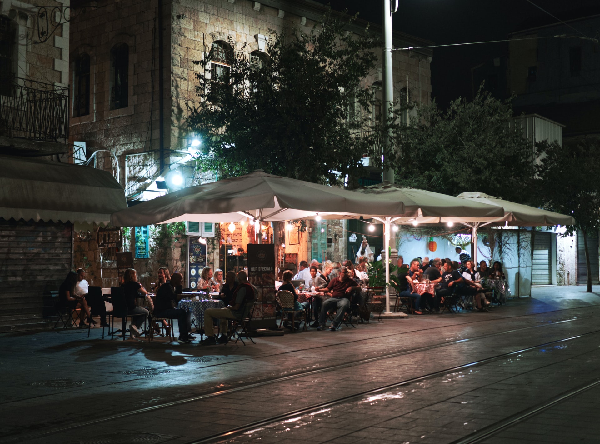 Photo of an outside restaurant area during the night