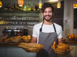 Baker showing off his bread